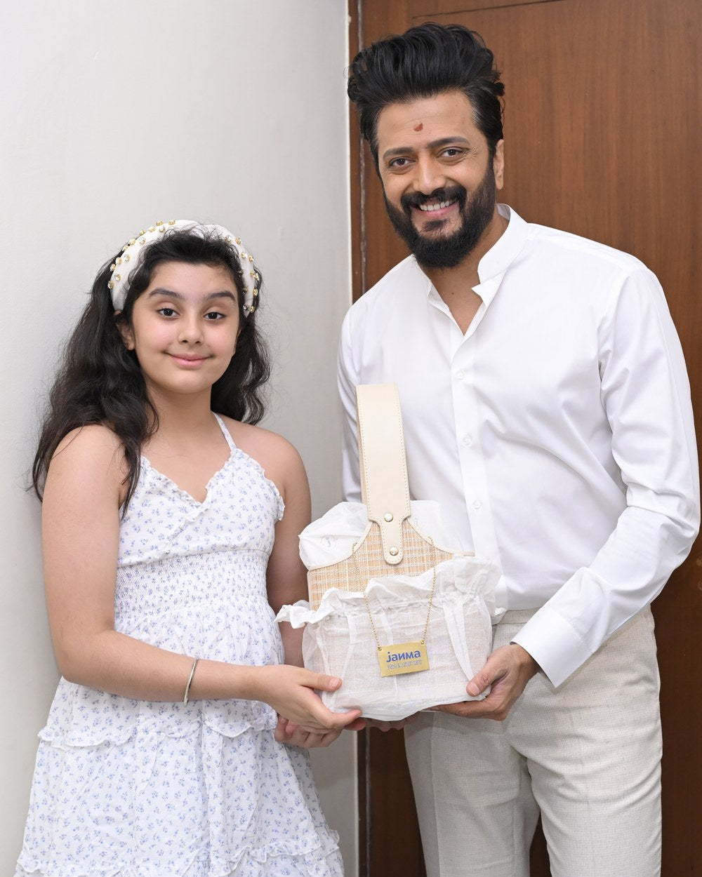 Riteish Deshmukh receiving a Janma gift hamper
